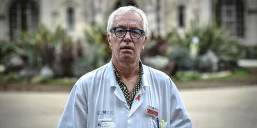Chief of Infectious and Tropical Diseases service at the Hopital Tenon, Gilles Pialoux, poses during a photo session on October 28, 2020, in Paris, amid a surge in Covid-19 (novel coronavirus) cases in France. (Photo by STEPHANE DE SAKUTIN / AFP)