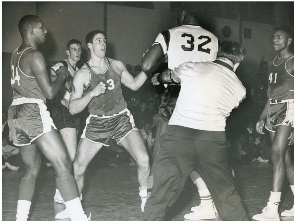 In 1963, award-winning photographer Frank Beardsley went to shoot the game at Neptune High School and got more than he bargained for. He labeled this image on the back simply as ``The Fight.’’ When the shot was uncovered more than five decades later, the events of that night and stories of those captured by Beardsley’s lens came to life once again.