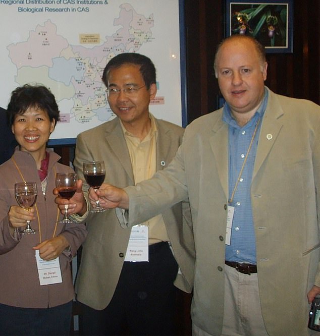 Peter Daszak (far right) pictured with 'Bat Woman' Shi Zhengli (left) who is known for her dedication to hunting down SARS-like viruses in caves in China