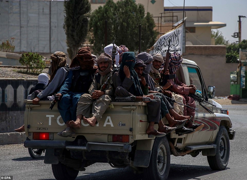 Members of the Taliban patrol in Kandahar in Afghanistan earlier today. The city fell to the Taliban just over a week ago