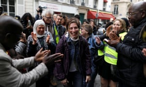 Leilani Farha, centre, visits homeless families in Paris