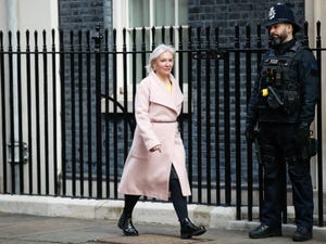 UK Culture Secretary Nadine Dorries walking outside Downing Street