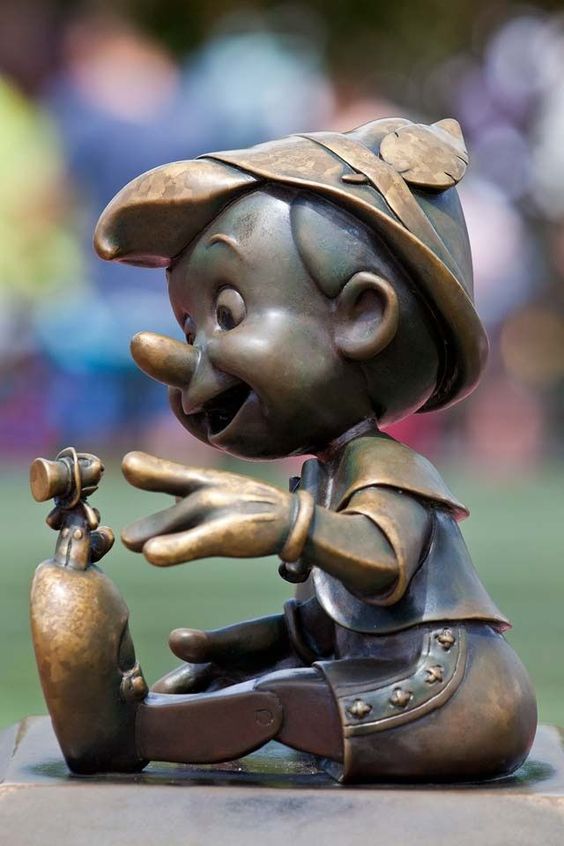 Always Let Your Conscience Be Your Guide.  Showing my #DisneySide with Pinocchio and Jiminy Cricket