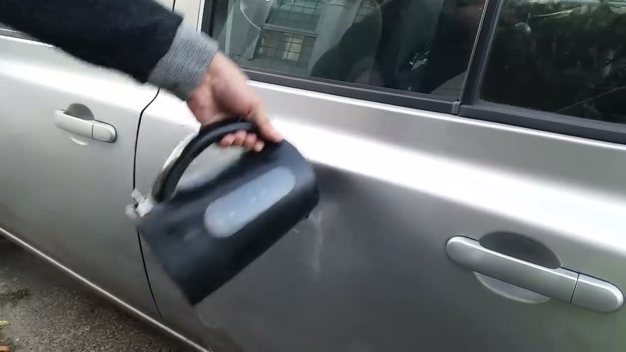 Image result for fixing a dent in a car with a plunger