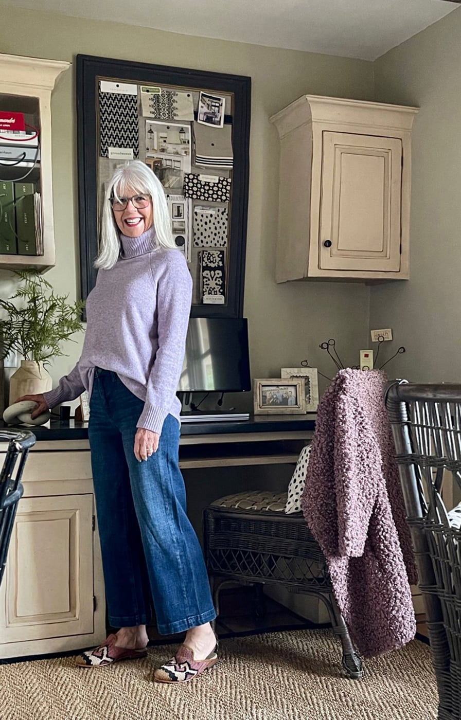 cindy hattersley in j crew sweater and banana republic jeans & artemis mules in her office 