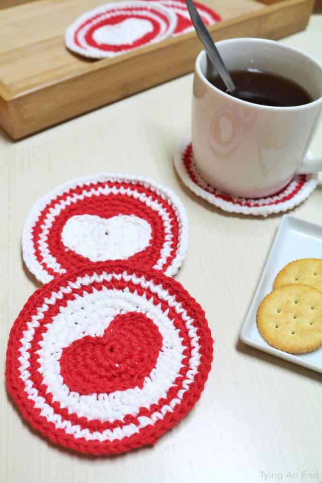 [Free Crochet Pattern] Perfect for Valentine's Day gift! Put a little love on the table and to the drink. Heart Crochet Coaster by Tying An End
