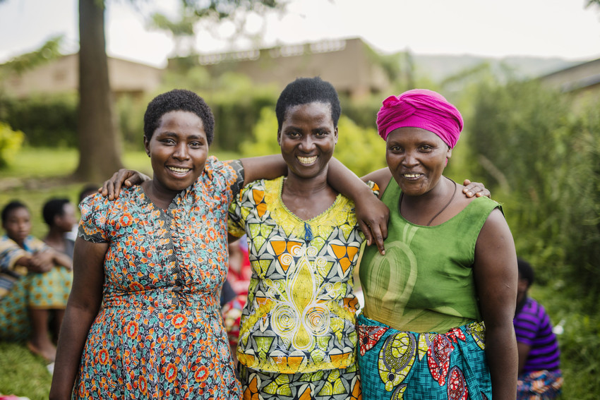 Donatel, Marrietta (35 years old), and Attaria are all part of a savings group with Women for Women International in Rwanda.