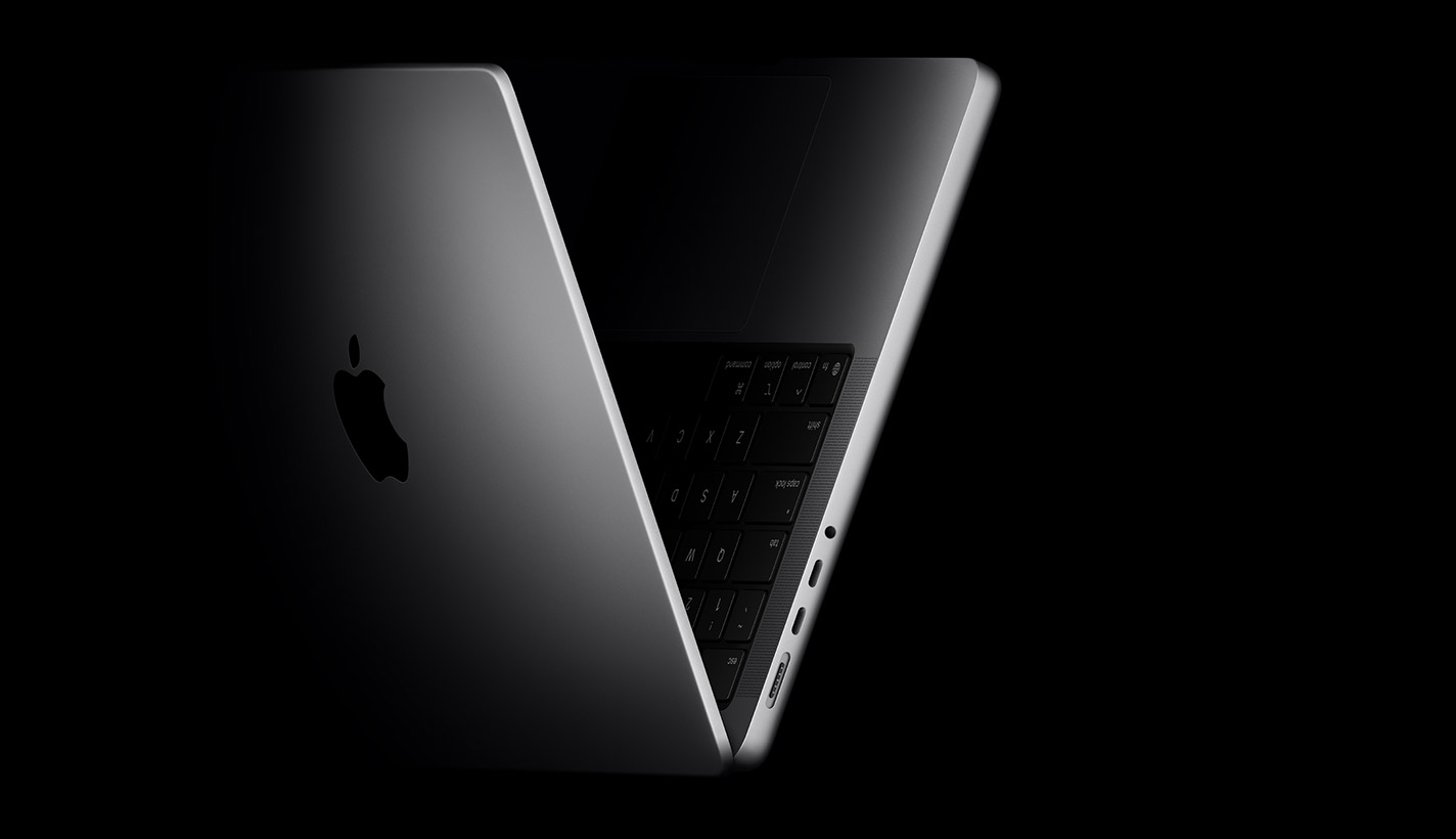 MacBook Pro positioned into the shape of a V, referencing the M5 chip