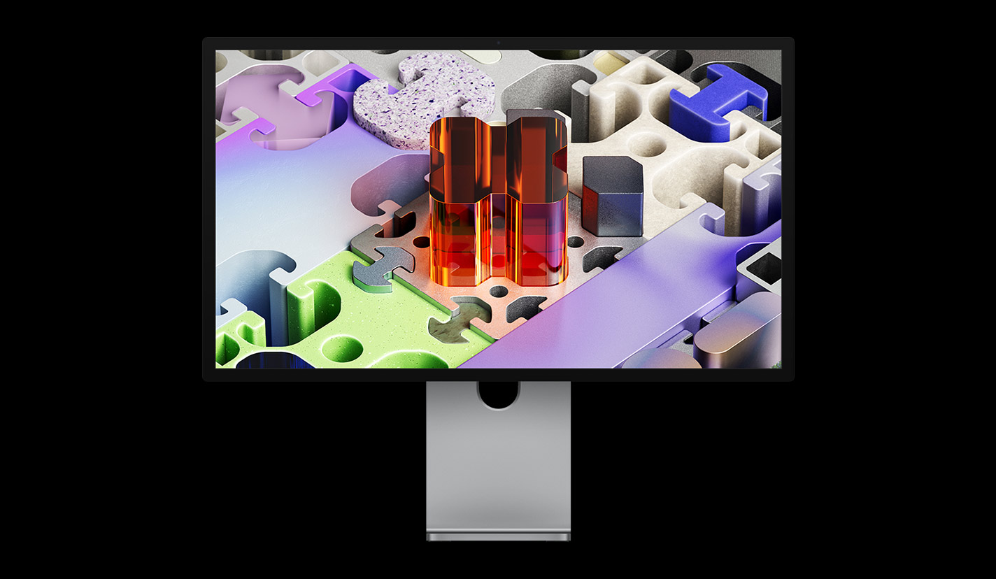 Front of Studio Display XDR with a three-dimensional puzzle-like wallpaper