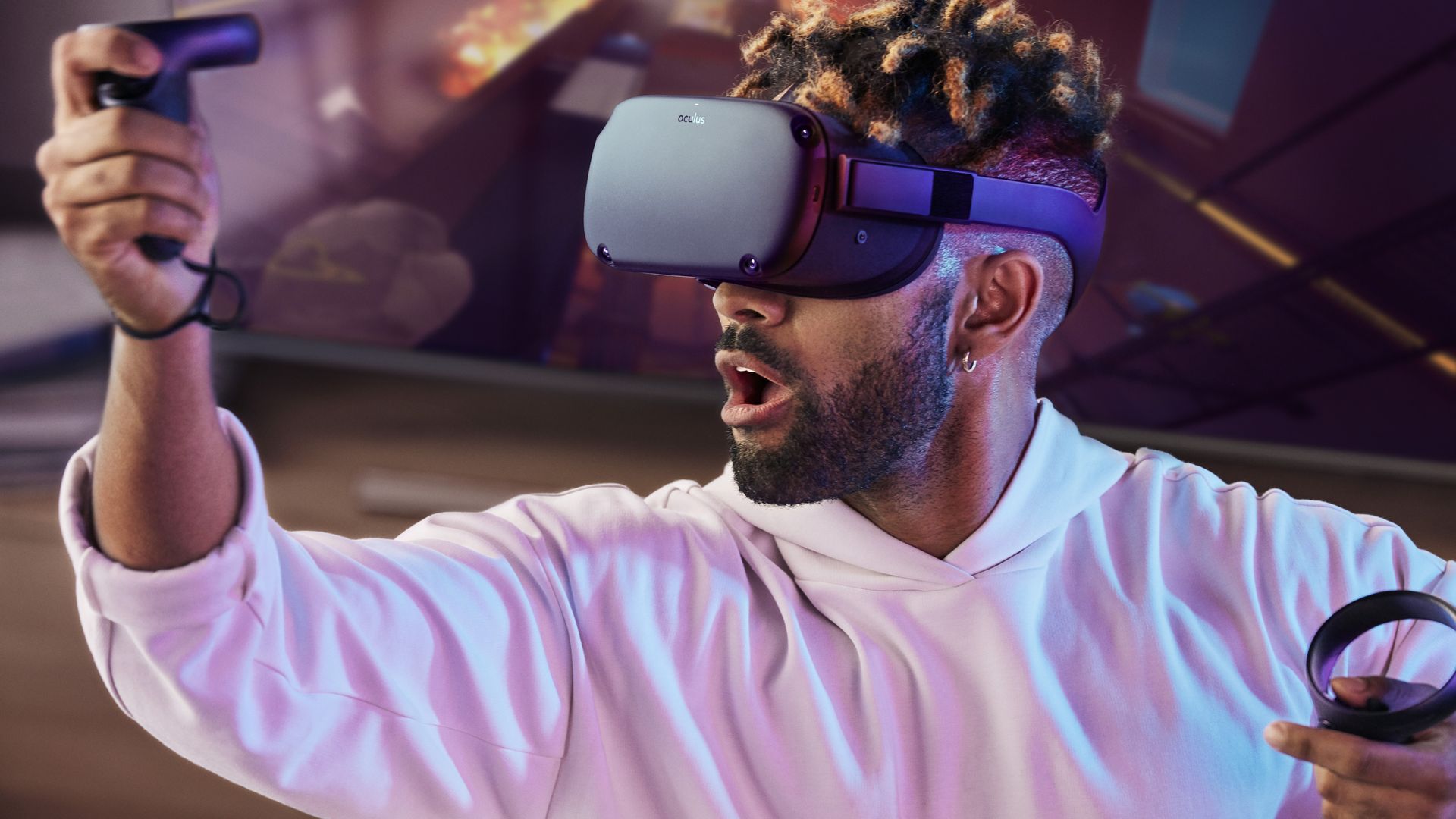 A man tries out the Oculus Quest VR headset