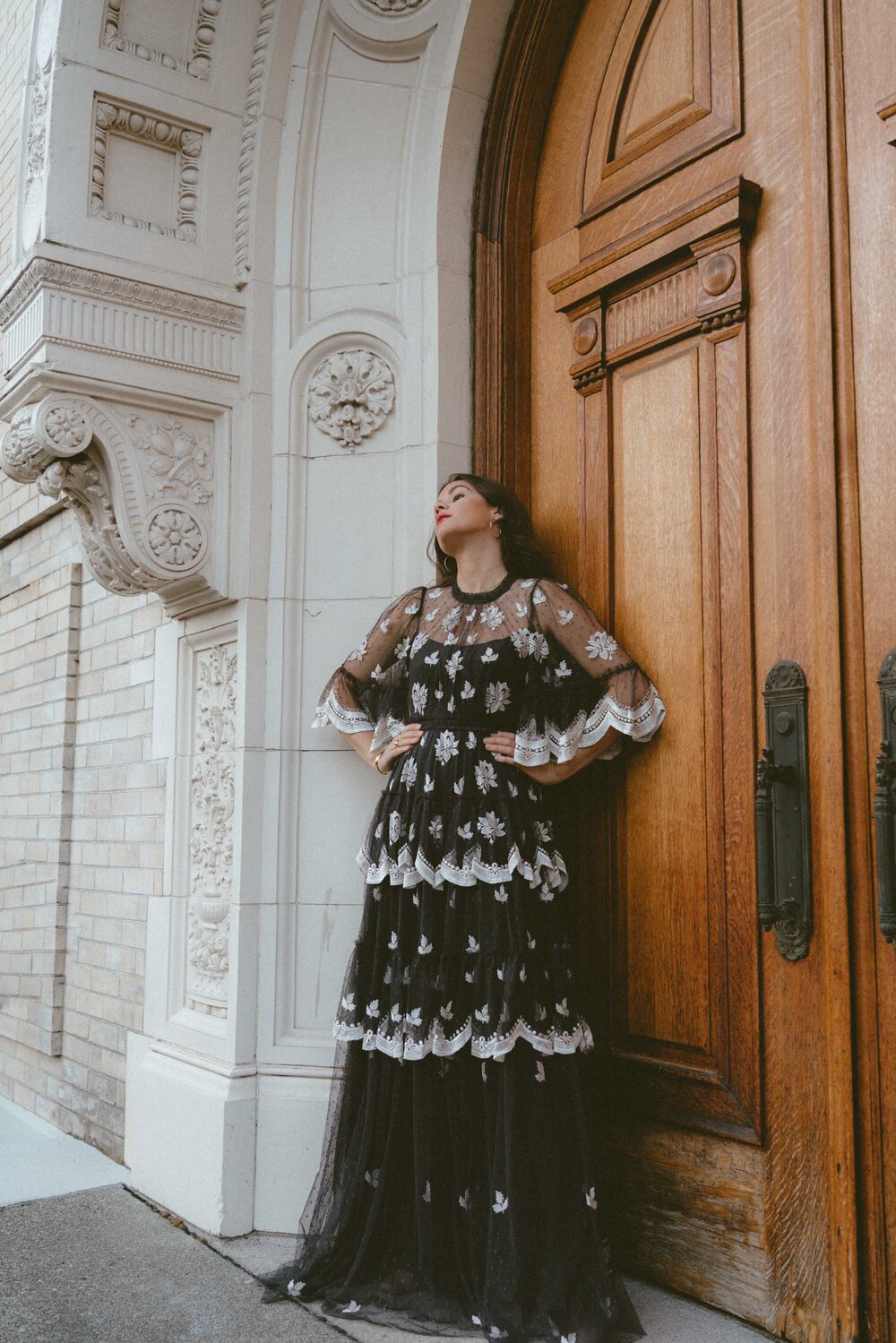 Chic vintage victorian inspired holiday dress. Sarah Butler of @sarahchristine wearing Needle and Thread Amber Petal Gown in Graphite made from sequin-embellished tulle with tiered ruffled trims and a semi-sheer fabrication in Seattle, Washington -7.jpg
