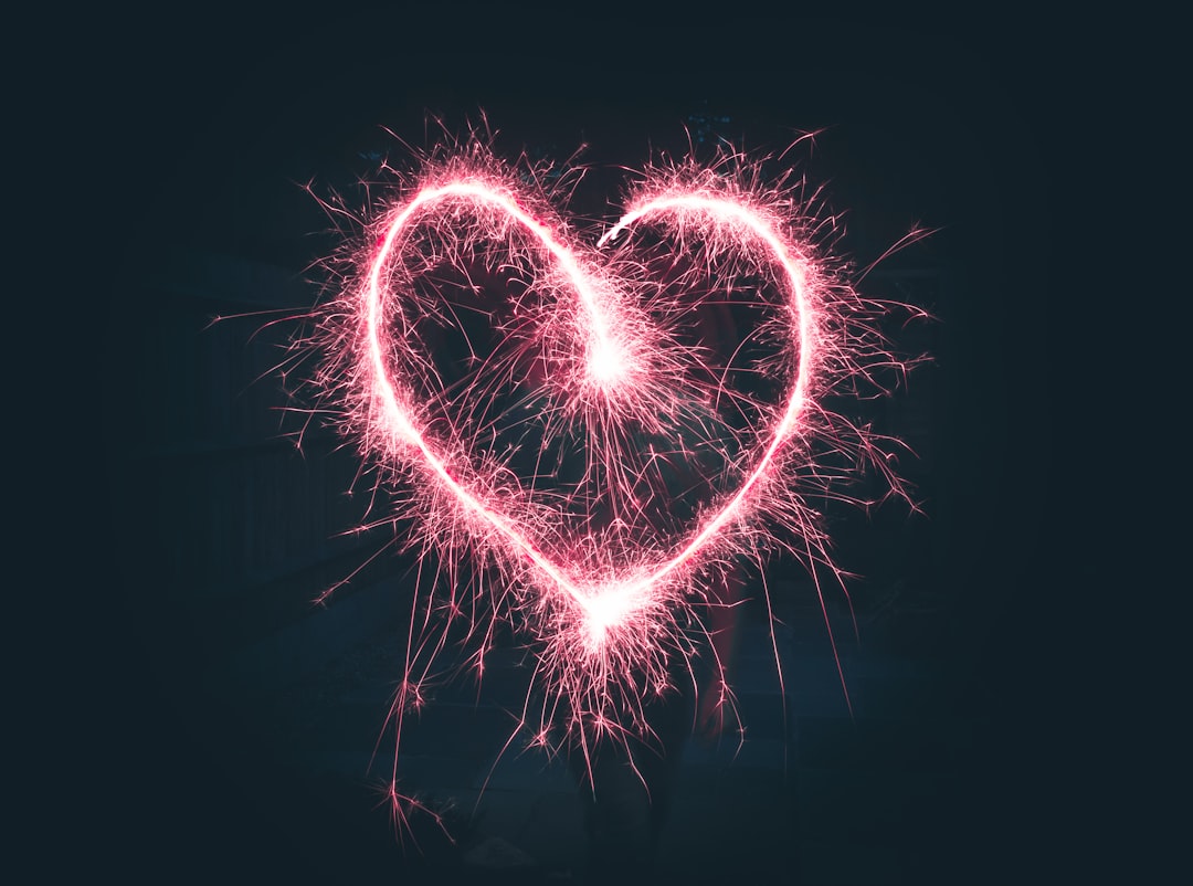 heart shaped pink sparklers photography ~ Photo by Jamie Street on Unsplash