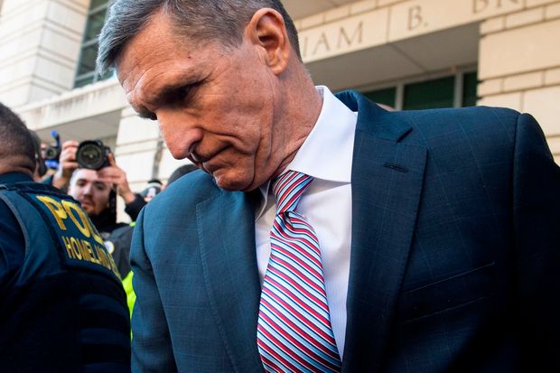 Former National Security Advisor General                      Michael Flynn leaves after the delay in his                      sentencing hearing at U.S. District Court,                      Washington, D.C., Dec. 18.
