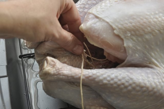 Remove the twine before carving for an attractive and presentable Thanksgiving turkey.