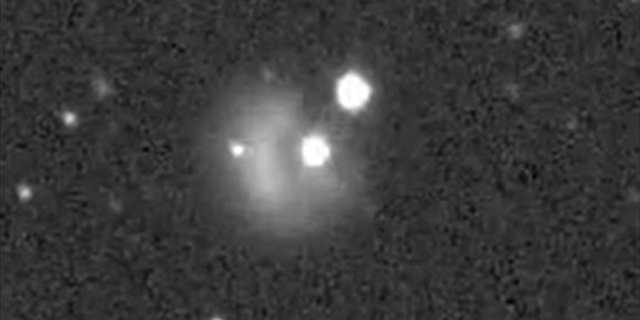 1. Primera imagen vía telescopio del impacto de DART contra un asteroide
