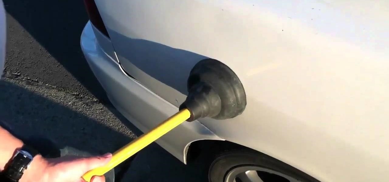 Image result for fixing a dent in a car with a plunger