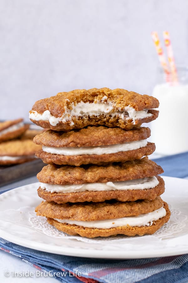 Homemade Oatmeal Cream Pies - these chewy oatmeal cookies with marshmallow filling are a perfect copycat of the store bought treats. Great recipe to make for dessert or bake sales.