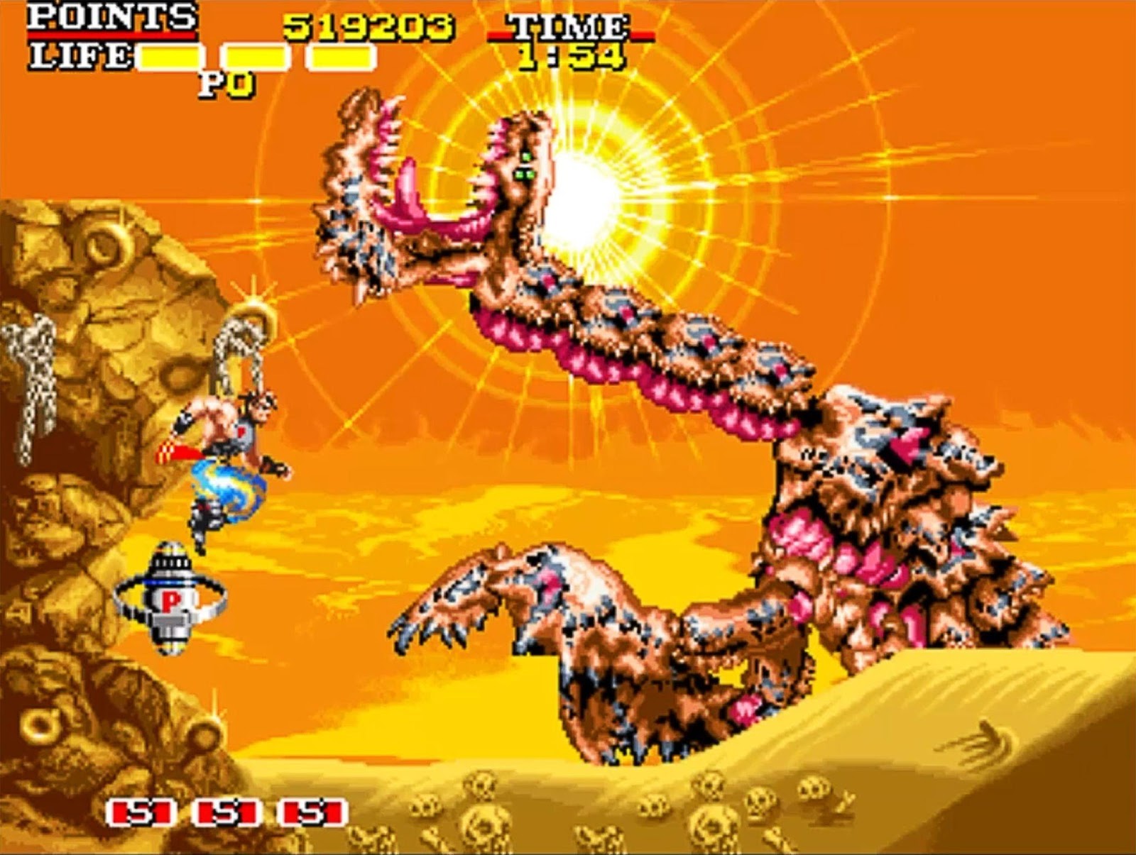 Hero in the desert level fighting a giant skeletal serpent.