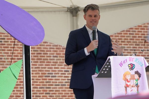 Secretary Kinsley speaking at the "Why Us Kids?" Rally.