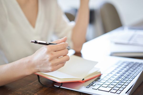 A person watching a webinar.