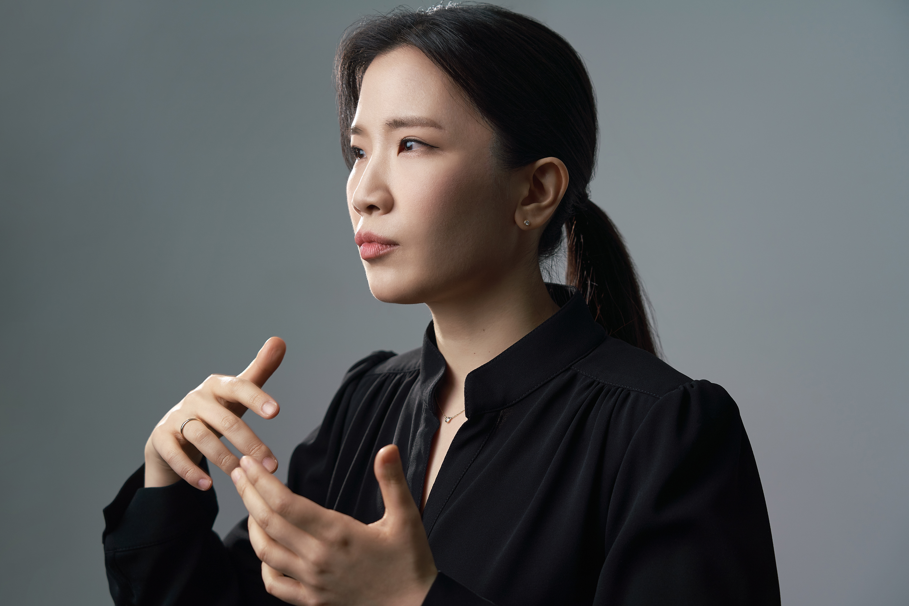 Woman conducting with hand gestures