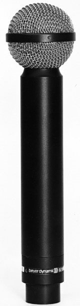 A picture containing microphone, bottleDescription automatically generated