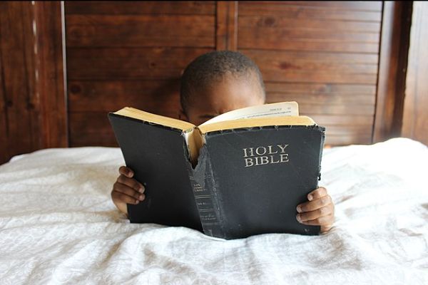 boy reading the Bible