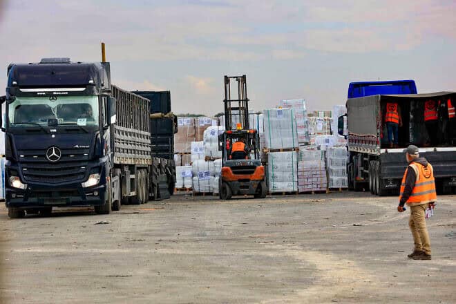 Trucks in Zikim, in southern Israel, with humanitarian aid for Palestinians in the Gaza Strip, Nov. 28, 2024. Photo by Oren Cohen/Flash90. Trucks in Zikim, in southern Israel, with humanitarian aid for Palestinians in the Gaza Strip, Nov. 28, 2024. Photo by Oren Cohen/Flash90.
