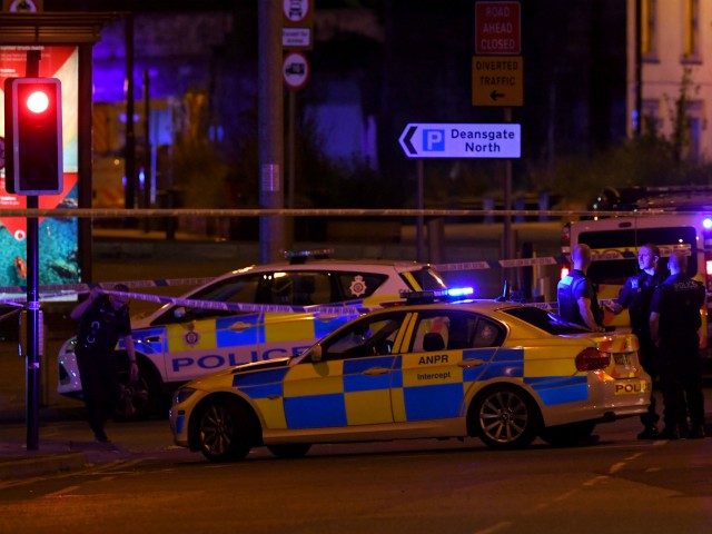 Police deploy at scene of explosion in Manchester, England, on May 23, 2017 at a concert. British police said early May 23 there were "a number of confirmed fatalities" after reports of at least one explosion during a pop concert by US singer Ariana Grande. Ambulances were seen rushing to …