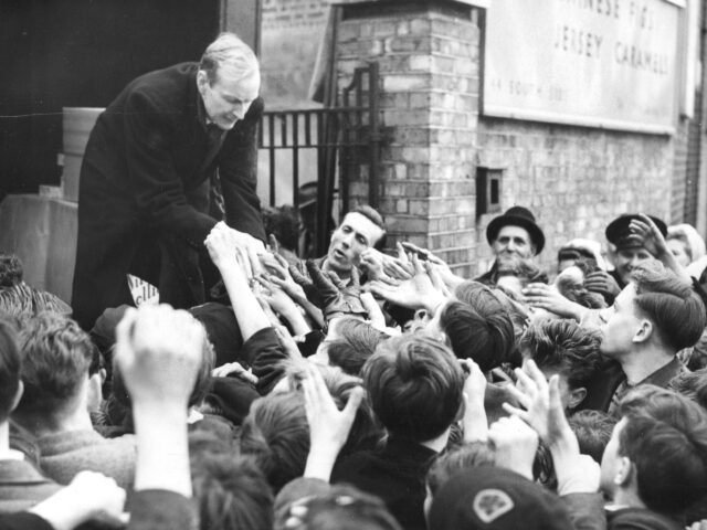 Eager hands of London children stretch out for sweets which were not only off the ration but were being distributed for free. The hand-out was at the front gates of Batger's, the confectioner manufacturers, at Clapham Common, London, when the firm gave away sweets to celebrate derationing. Rationing of sweets, …