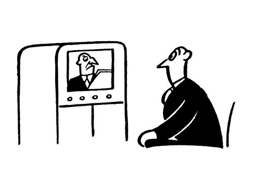 A man watching someone on TV.