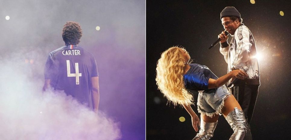 Jay-Z et Beyoncé, vêtus du maillot de l'équipe de France, lors de leur concert au Stade de France, dimanche 15 juillet
