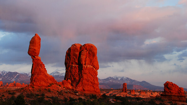 Balanced Rock at Arches National Park. Arches and Canyonlands both offer hiking, camping, biking and more for visitors, without the crowds common for Utah's Zion National Park.