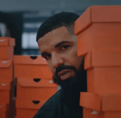 Drake Peeking GIF