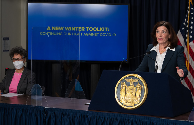 Governor Hochul stands at podium