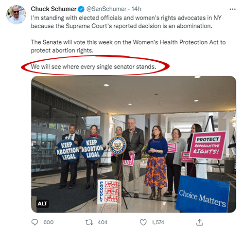 Screenshot of a tweet from Chuck Schumer that reads: I’m standing with elected officials and women’s rights advocates in NY because the Supreme Court’s reported decision is an abomination. The Senate will vote this week on the Women’s Health Protection Act to protect abortion rights. We will see where every single senator stands.