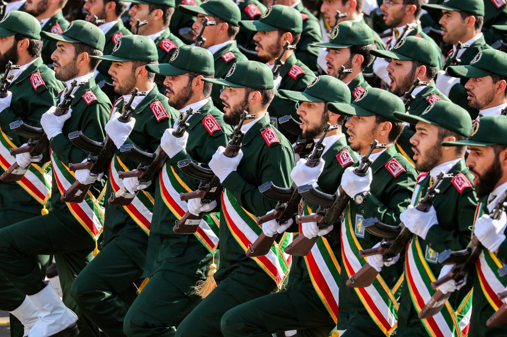 In this file photo taken on September 22, 2018 shows members of Iran's Revolutionary Guards Corps (IRGC) marching during the annual military parade which markins the anniversary of the outbreak of the devastating 1980-1988 war with Saddam Hussein's Iraq, in the capital Tehran.