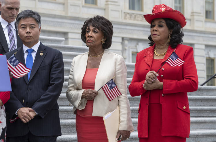 Rep. Maxine Waters (D-Calif.), center, joins other House Democrats at the Capitol to call for passage of the Keep Families Together Act, the House companion to the bill written by Dianne Feinstein. (J. Scott Applewhite/AP)