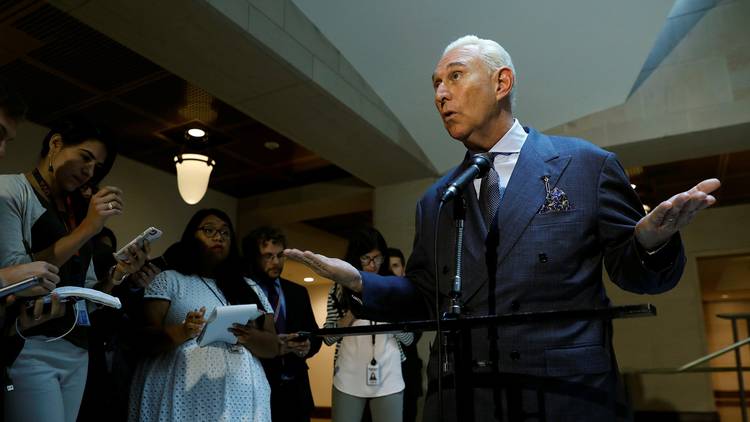 Roger Stone speaks to reporters after appearing before the House Intelligence Committee. (Kevin Lamarque/Reuters)