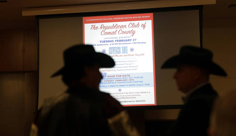 Folks attend a Republican congressional candidate forum in New Braunfels, Tex. (Eric Gay/AP)