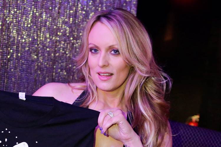 Stormy Daniels poses for pictures at the end of her striptease show in Gossip Gentleman club last month in Long Island, N.Y. (Eduardo Munoz/Reuters)