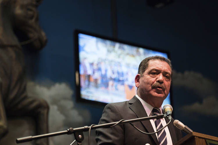 Jesus "Chuy" Garcia celebrates winning the Democratic primary in the 4th Congressional District. (Max Herman/Chicago Sun-Times via AP)