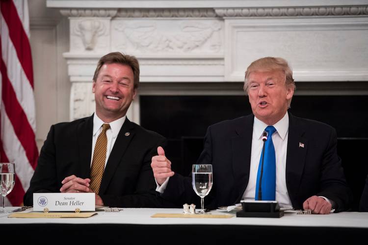 Donald Trump speaks with Sen. Dean Heller (R-Nev.) at a luncheon last summer. (Jabin Botsford/The Washington Post)