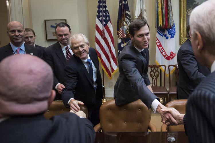 Peter Navarro, center left, and Jared Kushner, center, greet congressional leaders during a meeting last year. (Jabin Botsford/The Washington Post)