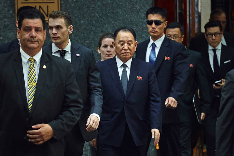 North Korea's Kim Yong Chol, center, leaves a hotel in New York. (Andres Kudacki/AP)