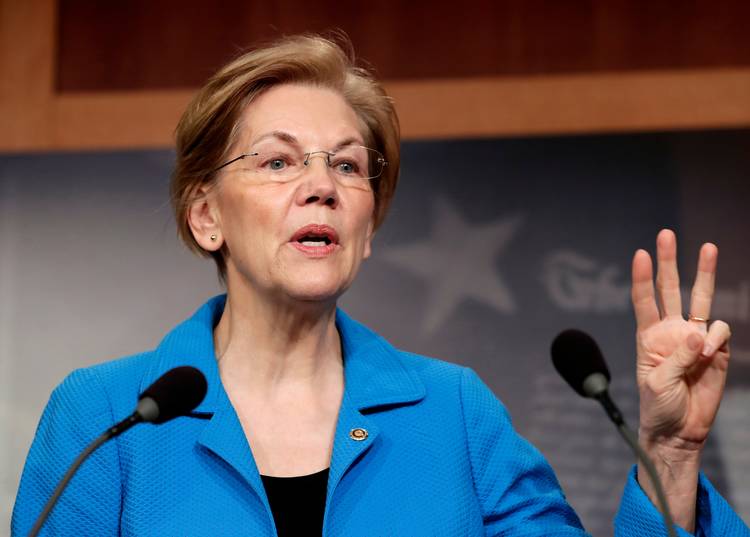 Sen. Elizabeth Warren (D-Mass.) expresses her opposition to rolling back some banking regulations. (J. Scott Applewhite/AP)