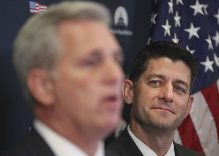 House Speaker Paul Ryan listens to House Majority Leader Kevin McCarthy speak to members of the media. (Pablo Martinez Monsivais/AP)