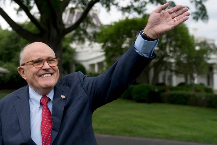 Rudy Giuliani waves to people on the South Lawn of the White House. (Andrew Harnik/AP)