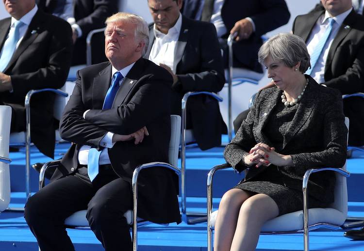 Trump and Theresa May attend a NATO ceremony in Brussels. (Dan Kitwood/AFP/Getty)