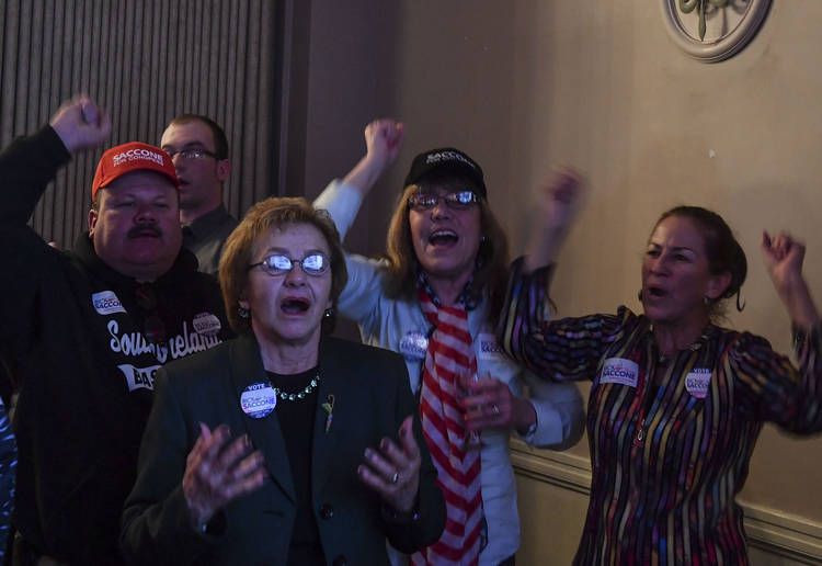 Rick Saccone supporters watch election results at his party in McKeesport, Pa. (Ricky Carioti/The Washington Post)